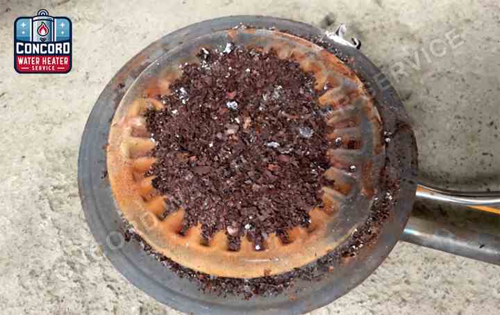 Sediment buildup in water heater tank in Concord California