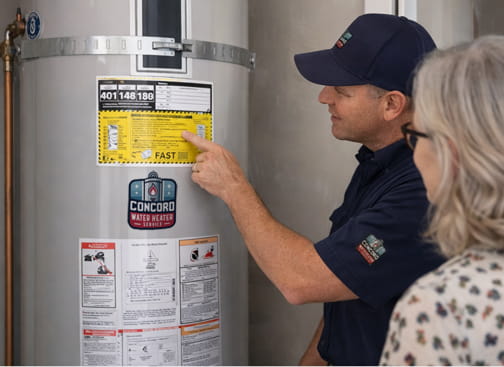 Water heater technician installing 40-gallon American Standard electric water heater in Gregory Gardens neighborhood in Pleasant Hill